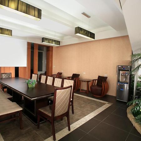 Spring Fountain Hotel Джиаоси Екстериор снимка