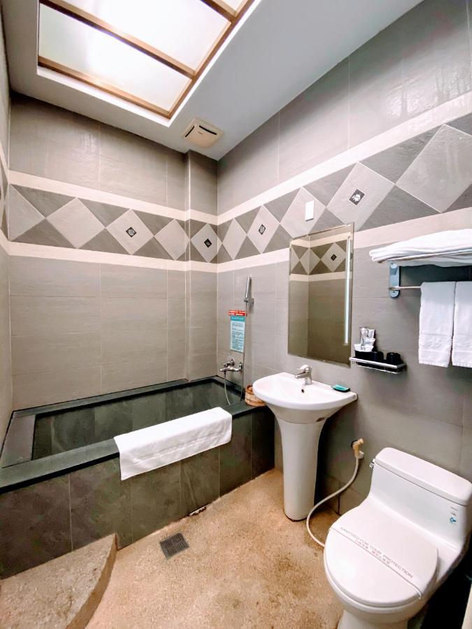 Spring Fountain Hotel Джиаоси Екстериор снимка