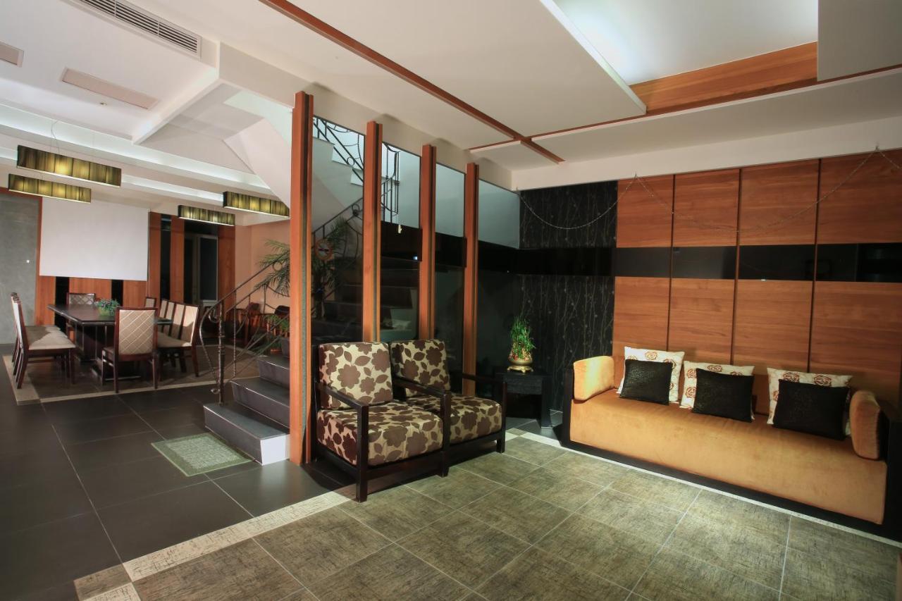 Spring Fountain Hotel Джиаоси Екстериор снимка