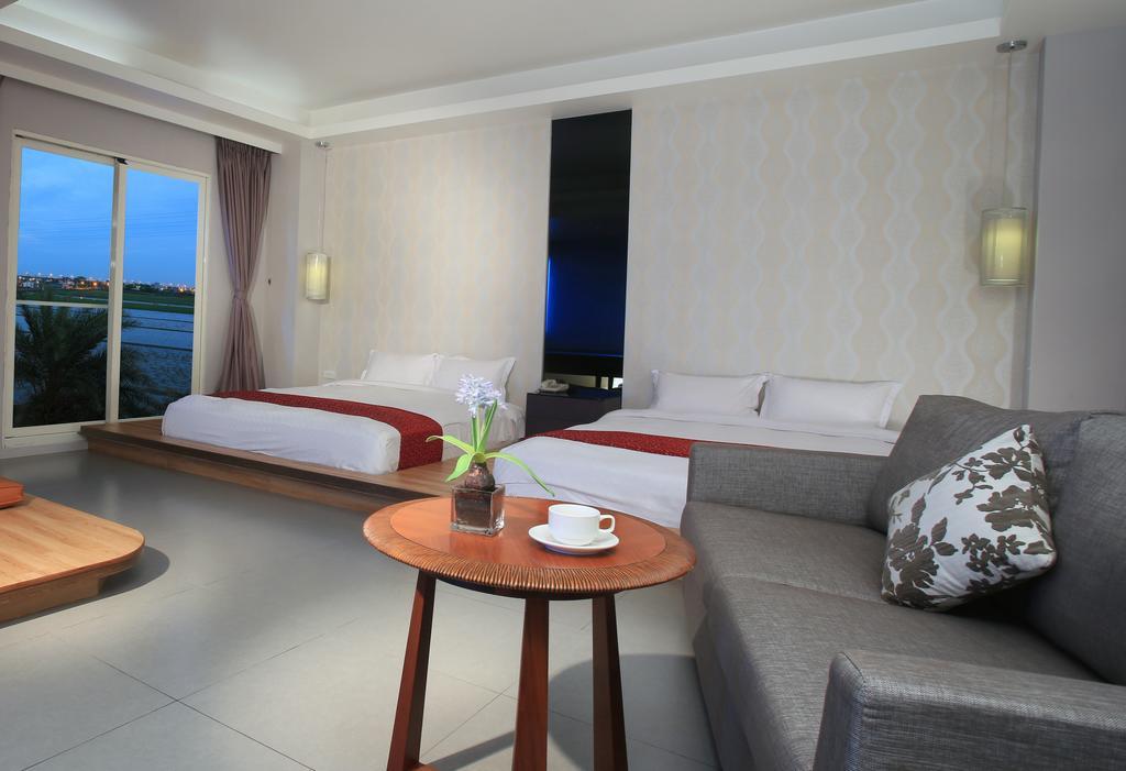 Spring Fountain Hotel Джиаоси Стая снимка